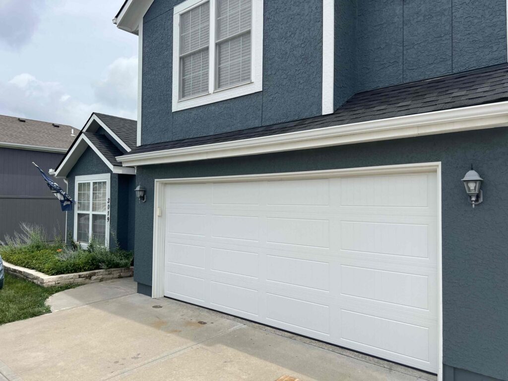 Hail & Storm Damage to Your Garage Door: What Homeowners in Kansas & Missouri Need to Do Next